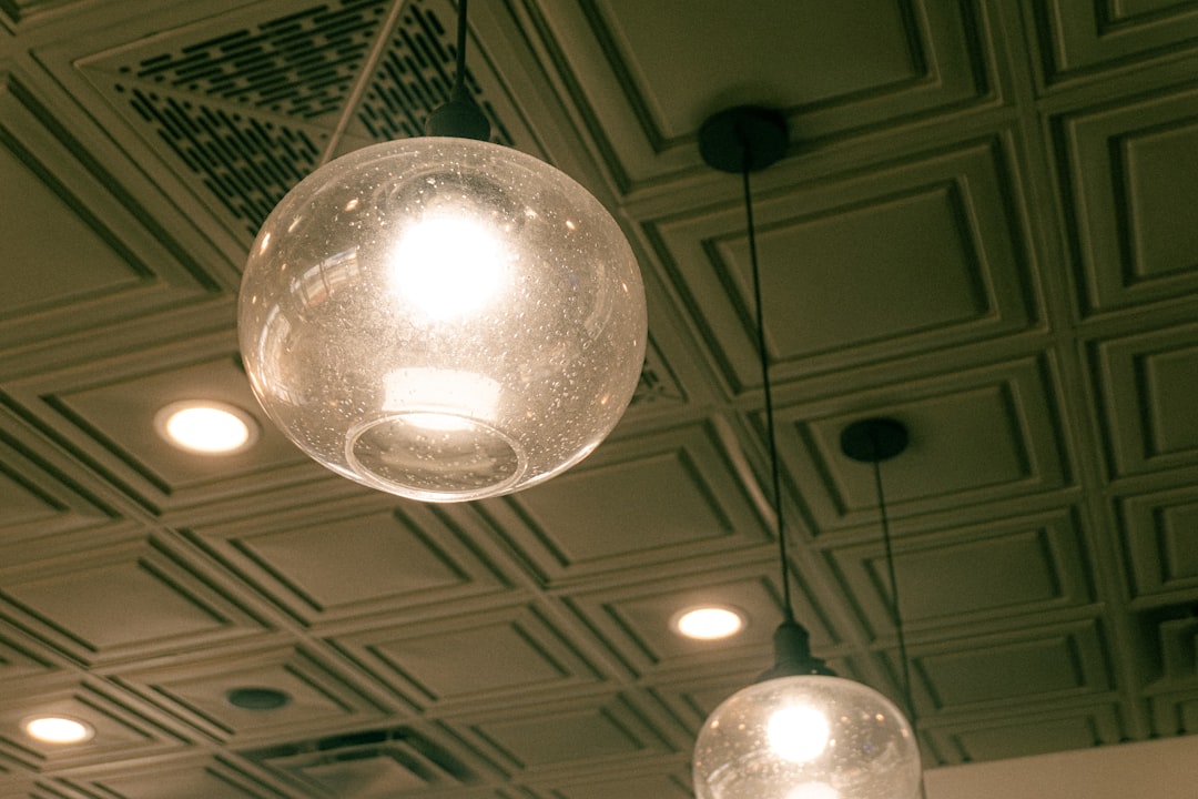 three-glass-globe-pendant-lights-hang-from-ceiling-uuiz9ifkrfa